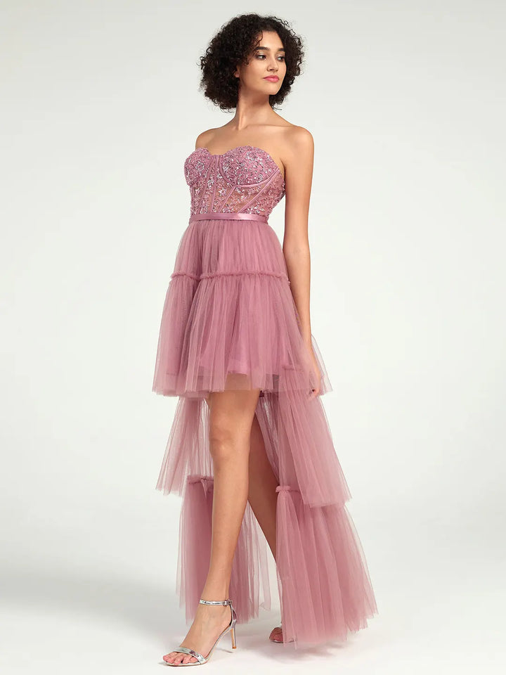 Elegant Dusty Rose High-Low Tulle Gown with Sweetheart Corset, Tiered Layers, & Beaded Details | Perfect for Proms & Formal Events Carlyna Elegant Dusty Rose High-Low Tulle Gown with Sweetheart Corset, Tiered Layers, & Beaded Details | Perfect for Proms & Formal Events Carlyna